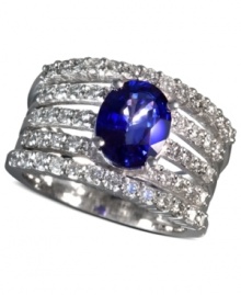 A true blue beauty. EFFY Collection's wide band ring highlights a stunning oval-cut sapphire at center (1-9/10 ct. t.w.) on a backdrop of five round-cut diamond covered bands (1 ct. t.w.). Set in 14k white gold. Approximate width: 7/8 inch.