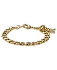 Fossil proves to be quite charming with this bracelet. The gold-tone mixed metal bracelet features a glass crystal pave heart and key details for added appeal. Approximate adjustable length: 7-3/4 inches.