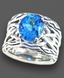 Eye-catching round-cut blue topaz (5-3/4 ct. t.w.) sits atop a woven sterling silver setting on this beautiful Effy Collection ring. Size 7.