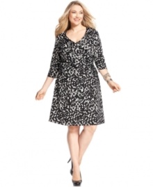 Look sensational and slender with Elementz' three-quarter sleeve plus size dress, featuring a slimming panel inset and an A-line shape.