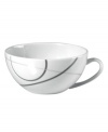 With a free-flowing circle design in shades of gray from Mikasa dinnerware, dishes like this bright white teacup add fun, contemporary appeal to any table. In ultra-durable porcelain.