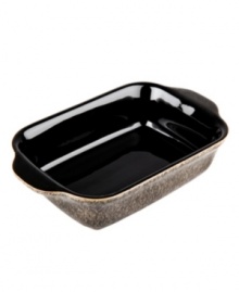 More than meets the eye, Denby's small Praline baking dish boasts standout durability in addition to style, whisking potatoes au gratin or baked apples straight from oven to table. With a distinct silhouette in casual stoneware and unique speckled glaze.