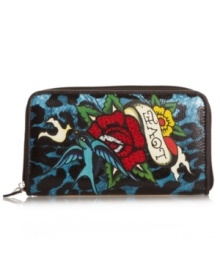 Fall in love with this tough yet tender wallet by Ed Hardy. An all-over leopard print is decorated with a flower and bird graphic print center and an easy access zip-around closure.