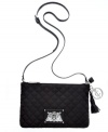 This irresistible crossbody from Juicy Couture is a beautiful way to breeze through summer right into fall.  Polished silver-tone hardware and plush quilted pattern accentuate any outfit, while the convenient adjustable strap makes it easy to wear.