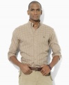 A preppy madras pattern enlivens a classic-fitting sport shirt, tailored from soft cotton twill for comfortable style.