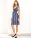 Take a walk on the wild side in INC's python-print dress. The surplice neckline and A-line fit is so flattering, too!