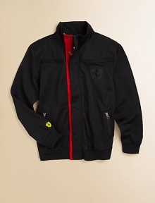 A tricot, zip-front jacket with zip pockets, Ferrari crest and Puma logo for cozy, cool style.Stand collarLong sleevesConcealed zip front with snap storm placketSlash zip pocketsPolyesterMachine washImported