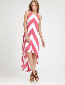 Bold chevron stripes pop on soft jersey in this asymmetric maxi shift.JewelneckSleevelessHem longer in backAbout 38 from natural waistRayonDry cleanMade in USAModel shown is 5'9 (175cm) wearing US size Small.