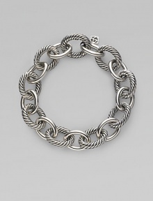 Bold, chunky links, alternating between smooth and cabled, create a bracelet that's both classic and of-the-moment with true Yurman style. Sterling silver Length, about 7½ Spring ring clasp Made in Italy