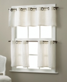 Bold grommets bring a modern appeal to classic café curtains and make setup a snap with oversized holes. Complete the look with coordinating valance.