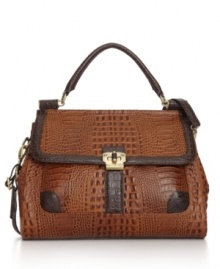 Creative contrast detailing elevates this chic croc tote into a new class of sophistication.