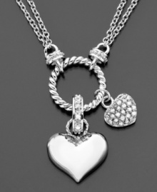 Triple the love in your life with this beautiful heart pendant by Victoria Townsend. Necklace features round-cut diamonds (1/4 ct. t.w.) set in sterling silver. Approximate length: 15 inches + 2-inch extender. Approximate drop: 1-1/2 inches.