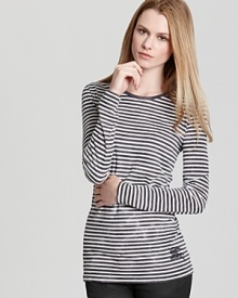 With crisp nautical stripes, this Burberry Brit tee is the building block to preppy-chic style.