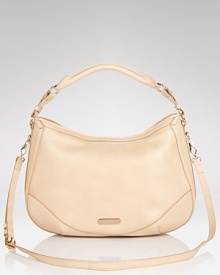 In neutral, pebbled leather, this Burberry hobo offers a versatile canvas that compliments every outfit.