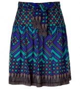 Stylish printed skirt in fine, pure silk - Vibrant electric blue, turquoise and grey colorway - Chic boho motif with trompe loeil fringe detail - Elegant trapeze silhouette - Gently pleated, hits at knee - Bow embellishment at waist - Versatile style works for the office, parties and leisure - Pair with a solid, streamlined top and sandals or wedges