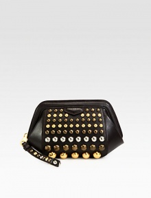 Round studs adds casual-cool edge to this leather silhouette in a portable size. Studded wrist strap, 6 dropTop zip closureOne inside zip pocketFully lined11W X 7H X 3DImported