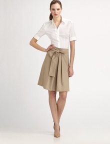 A crisp poplin skirt featuring a flattering silhouette and a self-tie belt that creates an ultra-feminine bow.Self-tie bow beltPleated front centerConcealed back zipperAbout 23 longCottonDry cleanImported Model shown is 5'11 (180cm) wearing US size 4. 