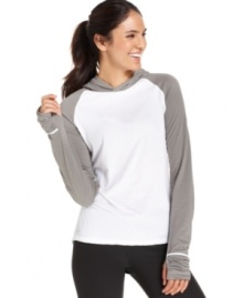 Nike's hooded sweatshirt gets a chic boost from subtle ruching and athletic-inspired raglan sleeves. Designed in moisture-wicking fabric with Dri-FIT technology, it's perfect for layering when the weather turns chilly.