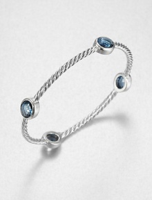 From the Renaissance Collection. Let this beautiful piece take you back in time with faceted London blue topaz stations on an iconic sterling silver cable design. London blue topazSterling silverDiameter, about 2.25Slip-on styleImported 