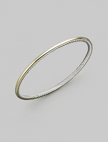 From the Cable Bangle collection. A smooth 18k gold exterior meets a cabled sterling silver interior on this truly unique bracelet. 18k yellow gold Sterling silver Diameter, about 2½ Imported