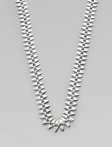 A unique design with tribal appeal in sleek sterling silver and radiant 24k gold. Sterling silver24k goldLength, about 39½ Lobster clasp closureImported 