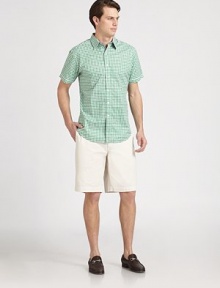 Trim-fitting short-sleeve style rendered in youthful gingham, with contrast trim on the collar and placket.Point collar Button front Contrast tab at back collarShort sleevesCottonMachine washImported