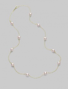 From the Akoya Collection. A delicate chain, sprinkled with lustrous white cultured Akoya pearls. 5mm white, round cultured pearls Quality: A+ 18k white gold Length, about 18 Spring ring clasp Imported