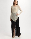 Fluid, floor-length jersey twists and drapes across the hips, with a front slit for an alluring glimpse of leg.Elastic waist Pull-on style About 49 long Micro modal Dry clean Imported