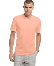 The classic polo that refines any casual look in a luxurious feeling cotton weave from Calvin Klein.