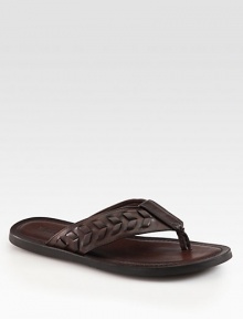 Intricate weave detail adds dimension to this classic sandal of soft Italian leather. Leather upperLeather liningPadded insoleRubber soleMade in Italy