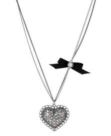 Show your love for all things Betsey! Betsey Johnson's sweet pendant necklace features a silver tone heart pendant with clear and blue-colored crystal accents, plus a black grosgrain ribbon with crystal accent. Crafted in rhodium-plated silver tone mixed metal. Approximate length: 16 inches + 3-inch extender. Approximate drop length: 1-3/4 inches. Approximate drop width: 1-3/5 inches.