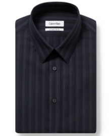 Fine lines. A subtle stripe and slim fit gives this Calvin Klein shirt an ultra-modern look.