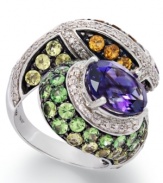 Serpentine sparkle. This stunning snake ring shines in oval-cut amethyst (3-1/5 ct. t.w.) and round-cut tsavorite (2-1/6 ct. t.w.), peridot (1-1/8 ct. t.w.), citrine (3/4 ct. t.w.), rhodolite (1/3 ct. t.w.) and white topaz (3/8 ct. t.w.). Set in sterling silver. Size 7.