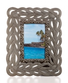 Water works. Handcrafted with a fluid design and texture reminiscent of fish, this charming picture frame recalls the lush and beautiful Caribbean coast that inspires so many Haitian artists.