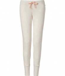 More chic than your average thermal, these neutral lounge pants from Juicy Couture will stylishly enliven your casual at-home style - Elasticized waist with bow drawstring, slim fit, large cuffs at hem - Wear with a matching camisole, fuzzy slippers, and a cozy robe