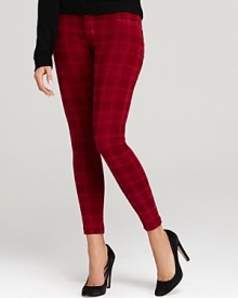 A check pattern emboldens these vibrant Hudson skinny jeans for a punk-meets-prep edge.