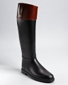 Brave the elements in signature Brit style with this equestrian-inspired rainboot from Burberry.