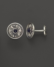 Elegant, intricately textured sterling silver cufflinks, set with onyx, from Buccellati.