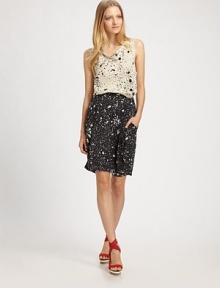 An inky pattern gives this playful pencil skirt a modern edge.Elasticized waistbandFront pleatsDraped side pocketsPull-on styleAbout 21 below natural waistSilkDry cleanImported