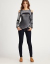 Cutout shoulders embolden this perennially chic striped top of super-soft jersey. RoundneckCutout shouldersLong sleevesLonger length hits below the hipsRayon/spandexDry cleanMade in USA of imported fabricModel shown is 5'10 (177cm) wearing US size Small.