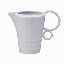 Modern in design with a raised circular pattern, made from French Limoges Porcelain. Dishwasher and microwave safe.