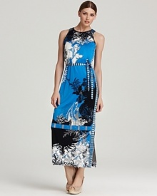 Go to great lengths in this Elie Tahari maxi dress showcasing graphic florals punctuated by statement stripes. Finish the look with sleek heels for modern appeal.