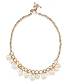 Everlasting elegance. Glass and plastic pearls combine on this classically chic necklace from Carolee. Crafted in antique gold tone mixed metal, it's an attractive addition to your workday wardrobe. Approximate length: 18 inches.