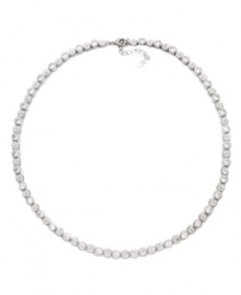 Pave perfection. Glittering pave crystals and cubic zirconias (9-1/2 ct. t.w.) adorn this chic collar necklace from Eliot Danori. Simple yet stunning by design, it's set in silver tone mixed metal. Approximate length: 16 inches + 2-inch extender.