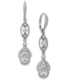 Walk the line between elegant and glamorous. Eliot Danori's stunning Splendor earrings feature gorgeous crystal accents and cubic zirconia (1-1/2 ct. t.w.). Finished with a leverback closure. Set in rhodium-plated mixed metal. Approximate drop: 1-1/4 inches.