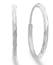 A must-have accessory for every collection. Giani Bernini's sterling silver hoop earrings feature a unique textured design. Approximate diameter: 3/4 inch.