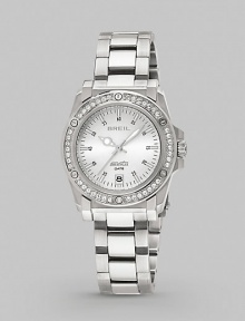 This sturdy yet feminine timepiece features a bezel of sparkling Swarovski crystals.Swiss quartz movement Water resistant to 10 ATM Swarovski crystal bezel Round stainless steel case, 34mm, (1.33) Date display at 6 o'clock Second hand Stainless steel link bracelet Safety lock closure Imported