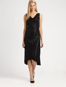 Shimmering sequins create a charming effect for this silk dress with a feminine dipped hem.Draped necklineSleevelessAllover sequinsDipped hemAbout 41 from shoulder to hemMerino woolDry cleanImportedSIZE & FIT Model shown is 5'10½ (179cm) wearing a US size Small. 