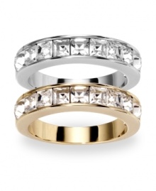 A dynamic--and dazzling!--duo: Swarovski's band rings sparkle plenty with bezel-set, square-cut clear crystals. Set in silver tone and gold tone mixed metal, they'll look stylish whether worn separately or together. Size 7.