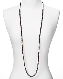 With smoky stones, Chan Luu's cotton cord necklace makes a simple statement. Forgo the fuss and layer the lengthy strand over breezy basics to be oh-so down-to-earth.